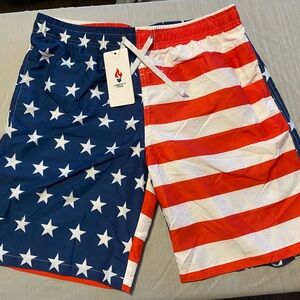3 pair of boys size L Swim Trunks - Red, White, and Blue; blue and black; black